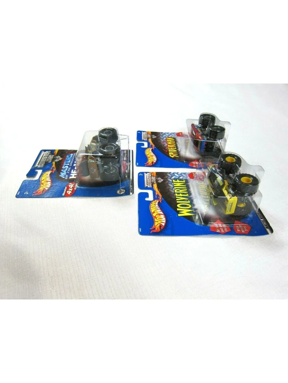 Lot of 3 Vintage Hot Wheels Monster Jam Wolverine, Spider-Man & He-Man 1:64 NEW